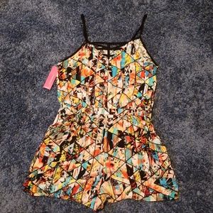 NWT multi colored romper (shorts).